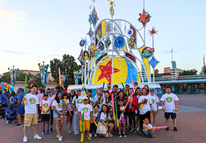 Photo: Glico USA employees and their families and friends revved up for an early three-mile walk. 